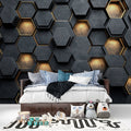 Modern living room featuring Black and Gold 3D Hexagon Wallpaper creating depth behind grey sofa