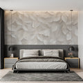 3D leaves wallpaper creating depth in modern living room with natural light highlighting textured pattern