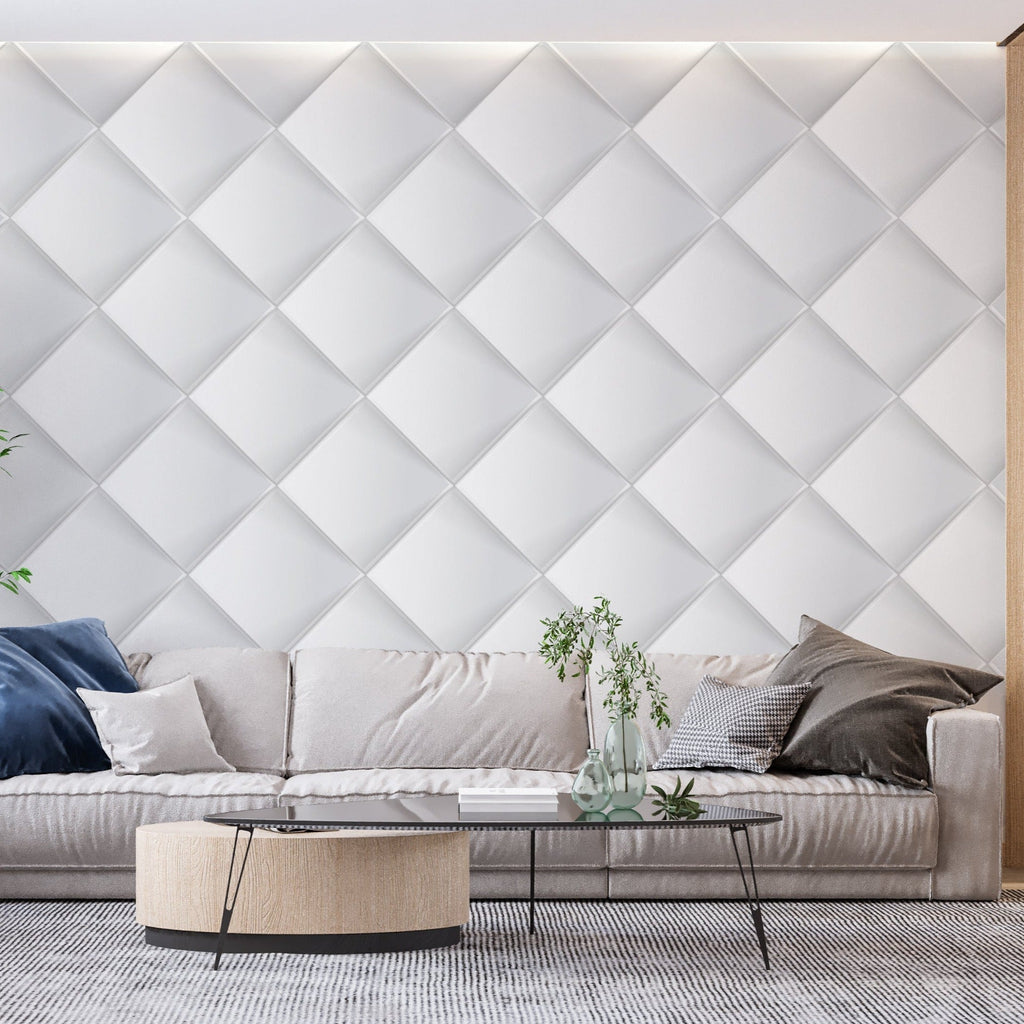 Geometric 3D white diamond pattern wallpaper creating depth in a contemporary bedroom setting