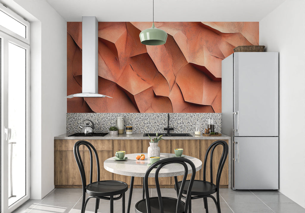 Dining area with sculptural 3D wallpaper in warm terracotta tones