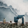 Abstract glacier wallpaper creating a modern Nordic feel in a minimalist living room with white furniture and natural light