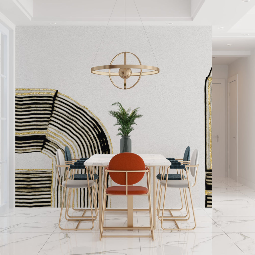Abstract black and gold wall mural creating drama in an elegant dining room