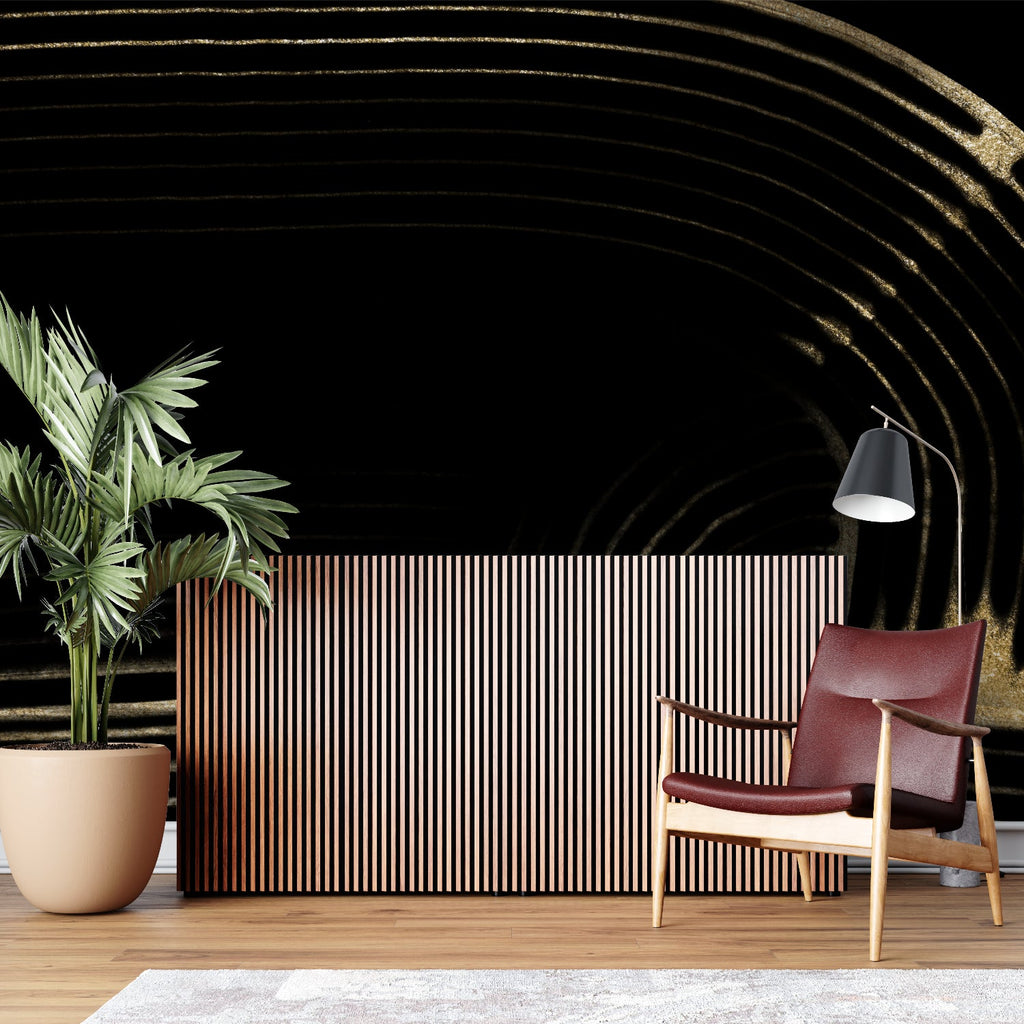 Black and gold curved line wallpaper in modern living room creates dramatic accent wall