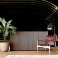 Black and gold curved line wallpaper in modern living room creates dramatic accent wall