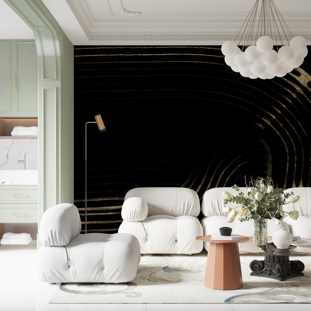 Abstract black and gold wallpaper creating dramatic backdrop in dining room setting