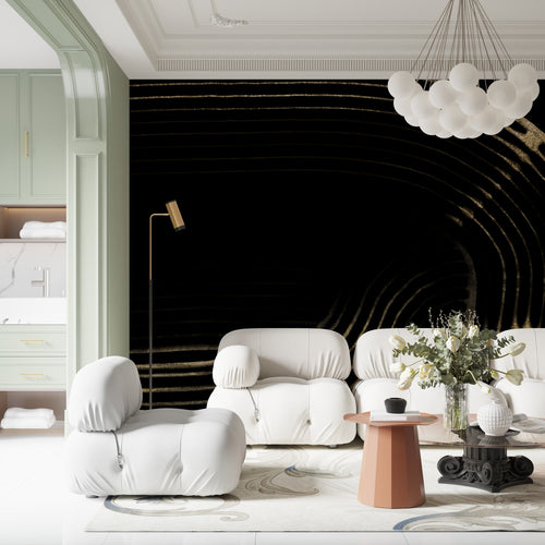 Abstract black and gold wallpaper creating dramatic backdrop in dining room setting