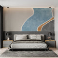 Abstract blue and terracotta curved wallpaper in a modern living room setting with minimal furniture