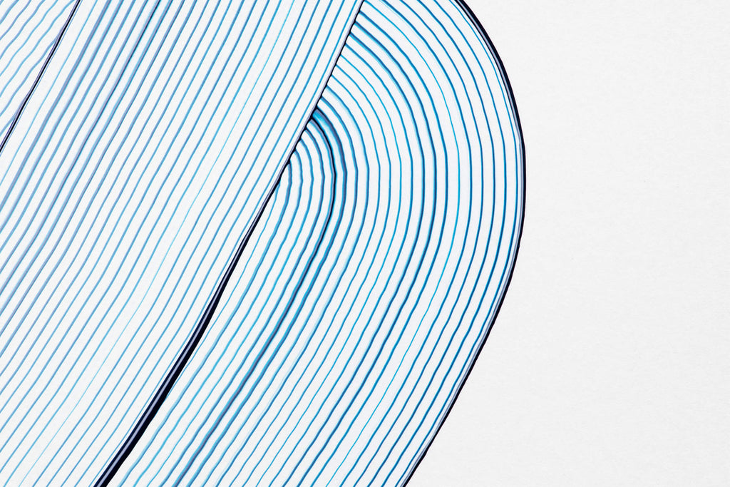 Blue linear wave pattern design file showing precise line work and wave movement