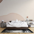 Modern living room with curved beige arch wallpaper creating depth and architectural interest
