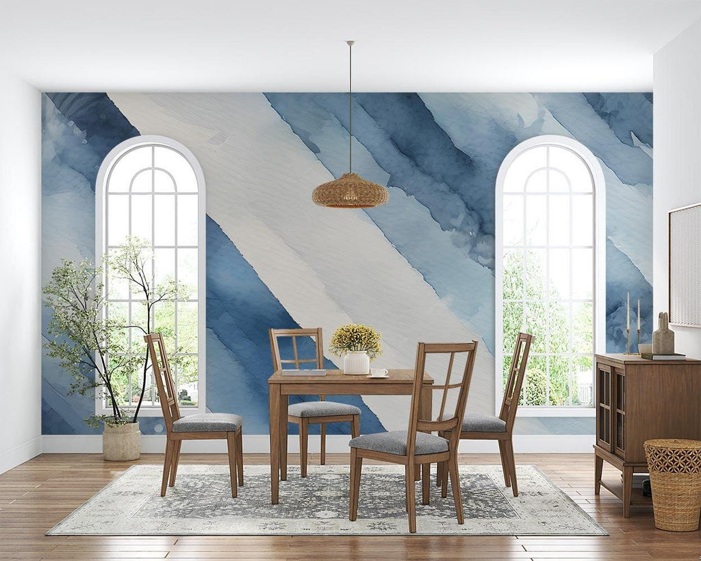 Modern blue abstract wallpaper mural in bright living room setting with white sofa and natural light