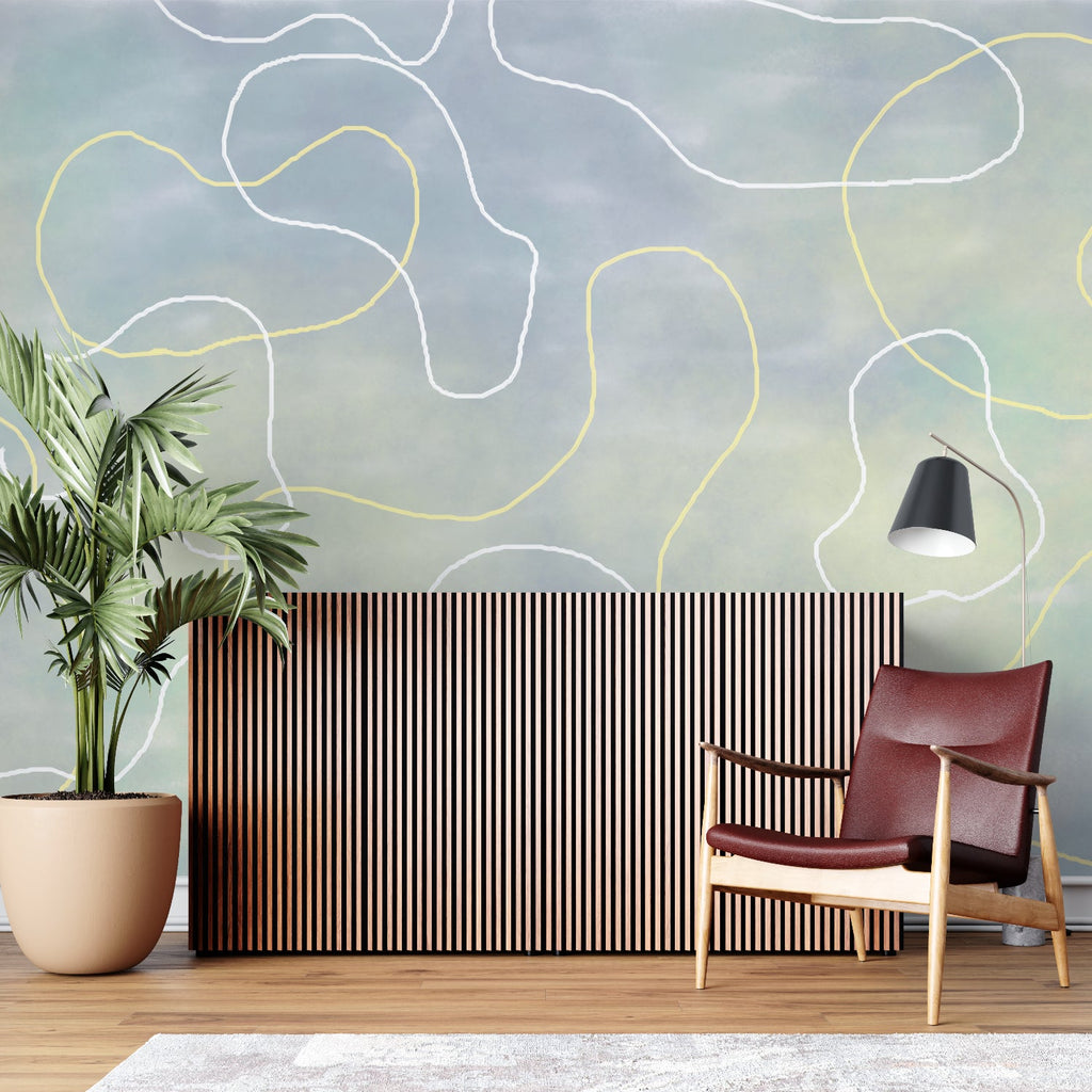 Abstract curve mural bringing style to a dining room with pendant lighting