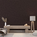 Modern brown wave pattern wallpaper displayed in a minimalist living room, creating a sophisticated focal wall