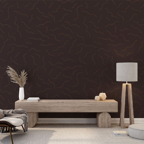 Modern brown wave pattern wallpaper displayed in a minimalist living room, creating a sophisticated focal wall