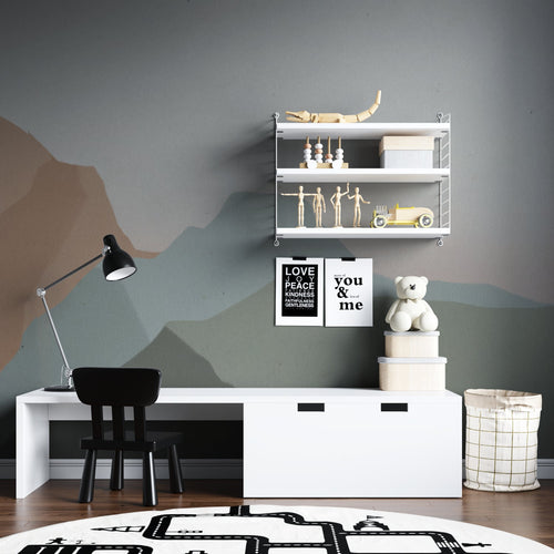 Modern abstract green wallpaper bringing depth to a minimalist living room with grey furniture