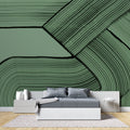 Modern green geometric wallpaper in a bright living room creating a fresh contemporary atmosphere