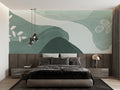 Modern green abstract mountain wallpaper in a bright Scandinavian living room creating a peaceful atmosphere