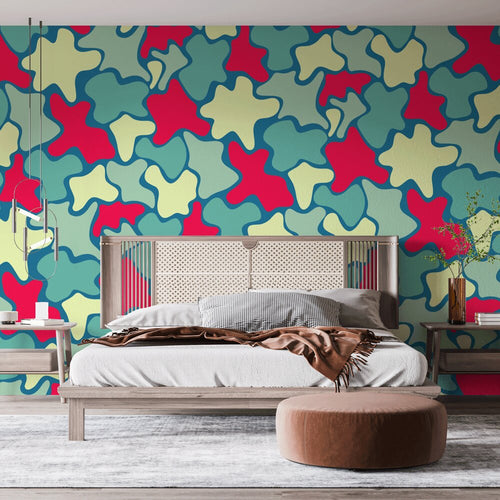 Modern abstract wallpaper with red and teal organic shapes creating a bold statement in a minimalist living room