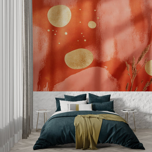 Terracotta and gold circle wallpaper creating warmth in a dining room
