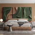 Modern wave wallpaper in green and beige showcased in a bright, minimalist living room setting with contemporary furniture
