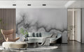 Modern grey abstract cloud wallpaper in a minimal living room setting with contemporary furniture