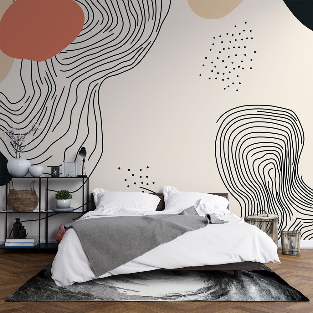Abstract line art wallpaper creating a modern focal point in a minimalist living room with terracotta and cream accents