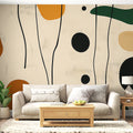 Abstract earth tone wallpaper creating a cozy atmosphere in a modern living room with natural light and minimal furniture