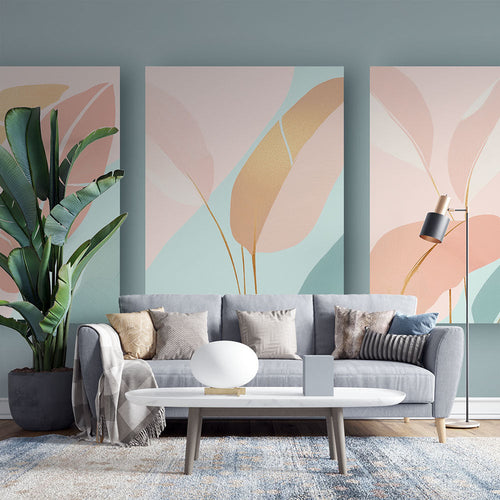 Abstract leaf wallpaper with gold accents creating a soft, elegant atmosphere in a modern living room with natural light