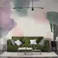 Abstract watercolor wallpaper in pastel colors creating a soft, artistic atmosphere in a bright modern living room