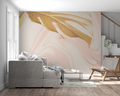 Pink and gold marble wallpaper in modern living room showing flowing abstract design