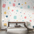Modern geometric dot wallpaper bringing life to a bright home office space, with desk and creative workspace setup