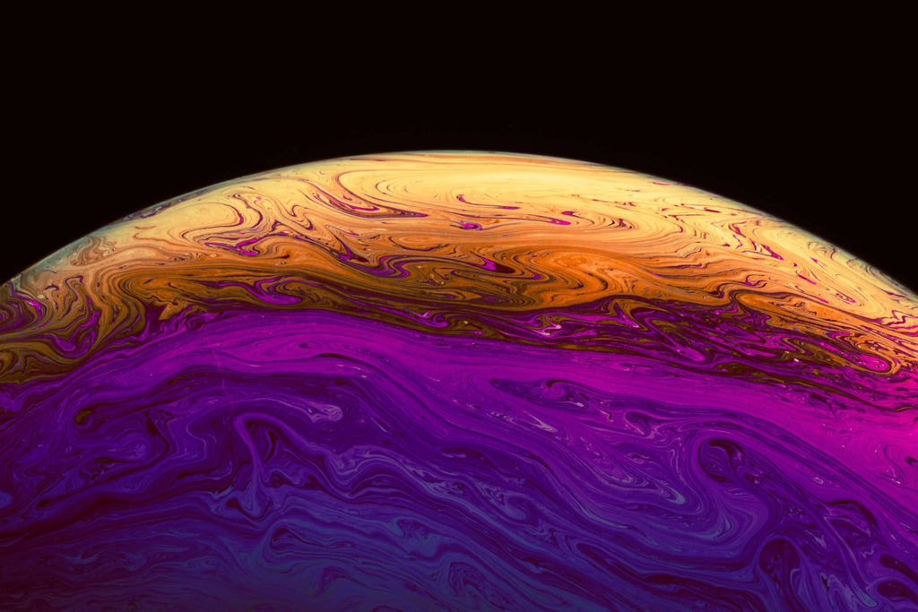Design file showing purple and gold cosmic wave pattern with detailed swirls