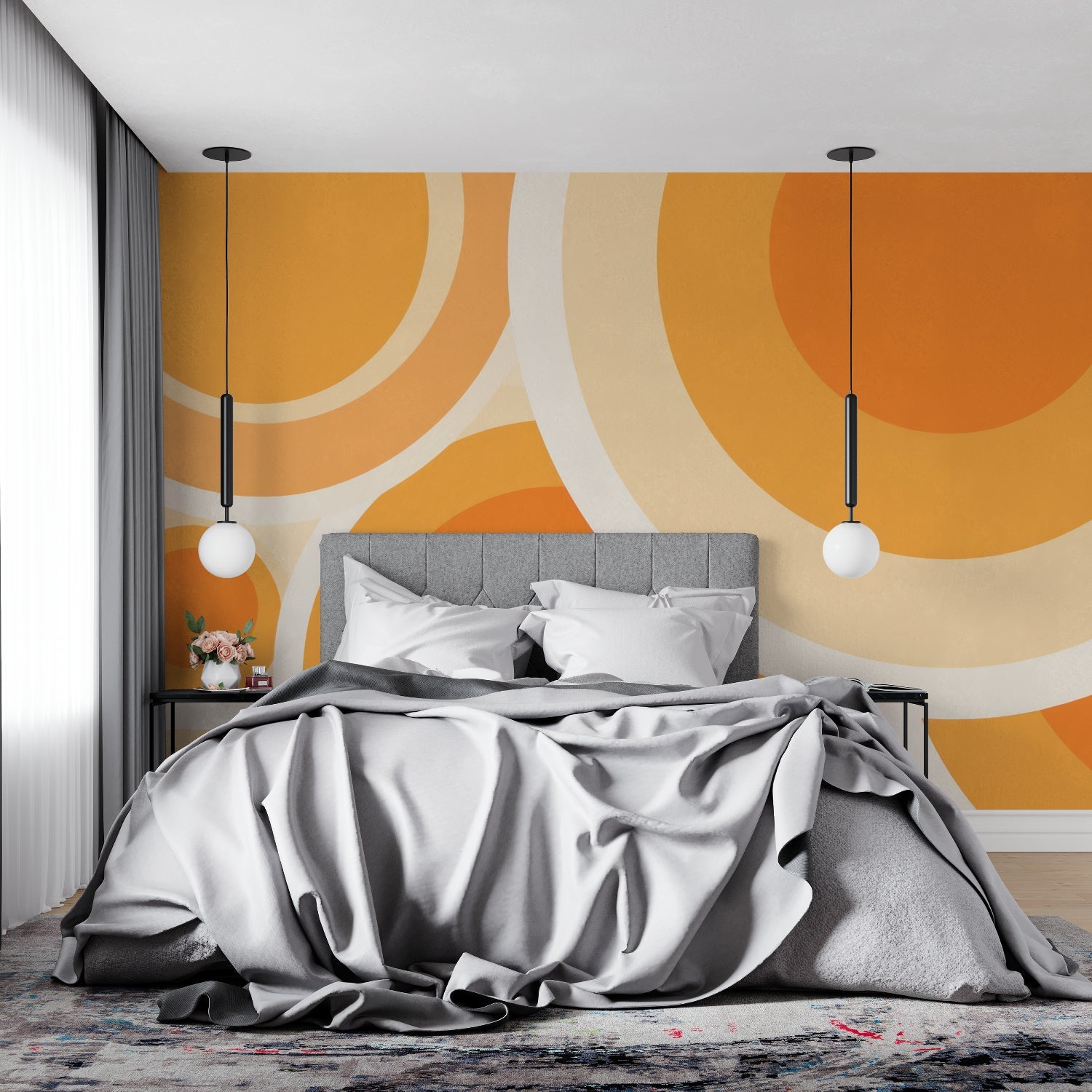 Geometric orange wallpaper creating feature wall in bedroom