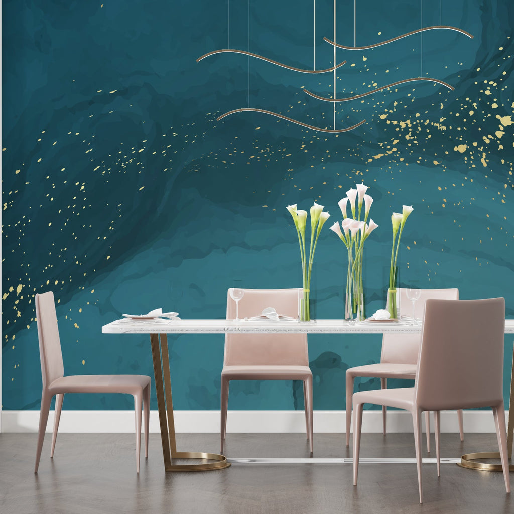 Teal and gold abstract wallpaper in modern living room with grey sofa and minimal decor