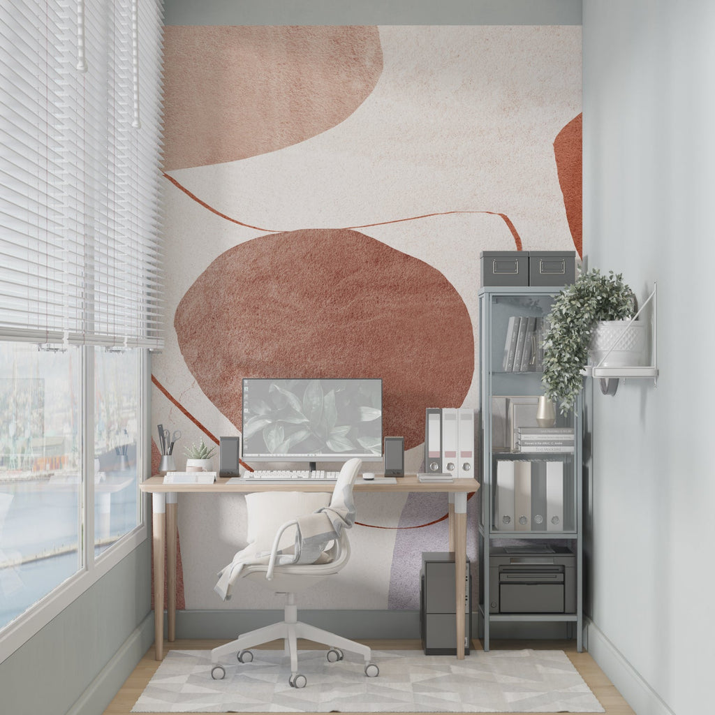 Modern home office featuring geometric abstract wallpaper in warm tones