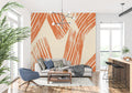 Terracotta abstract wallpaper in modern living room creates warm, artistic atmosphere