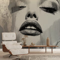 Abstract portrait wallpaper creating dramatic impact in modern living room with minimalist furniture