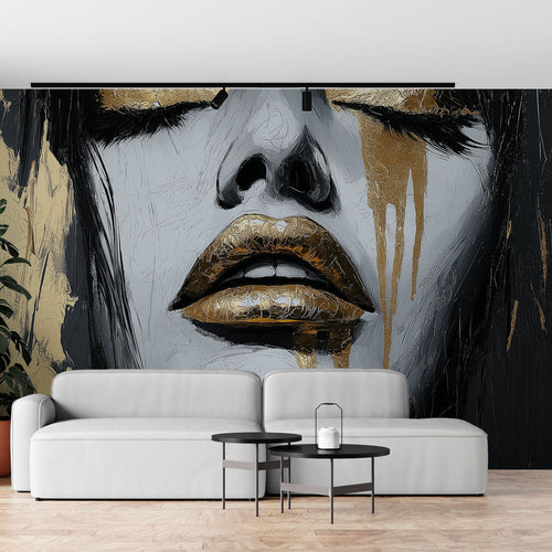 Abstract portrait wallpaper in gold and black creating drama in a modern living room with high ceilings