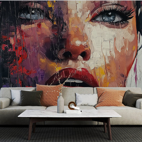Abstract Portrait Mural Wallpaper creating drama in a modern living room with minimalist furniture and mood lighting