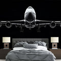 Modern Airplane Wallpaper displayed in a minimalist office space, showing black and white aviation design