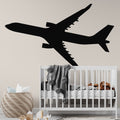 Modern Airplane Wallpaper displayed in a bright kids bedroom, showing black aircraft silhouette against beige background