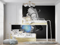 Black and white manga hero wallpaper in modern gaming room creating dramatic focal point