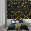 Art deco black and gold wallpaper creating drama in a modern living room setting