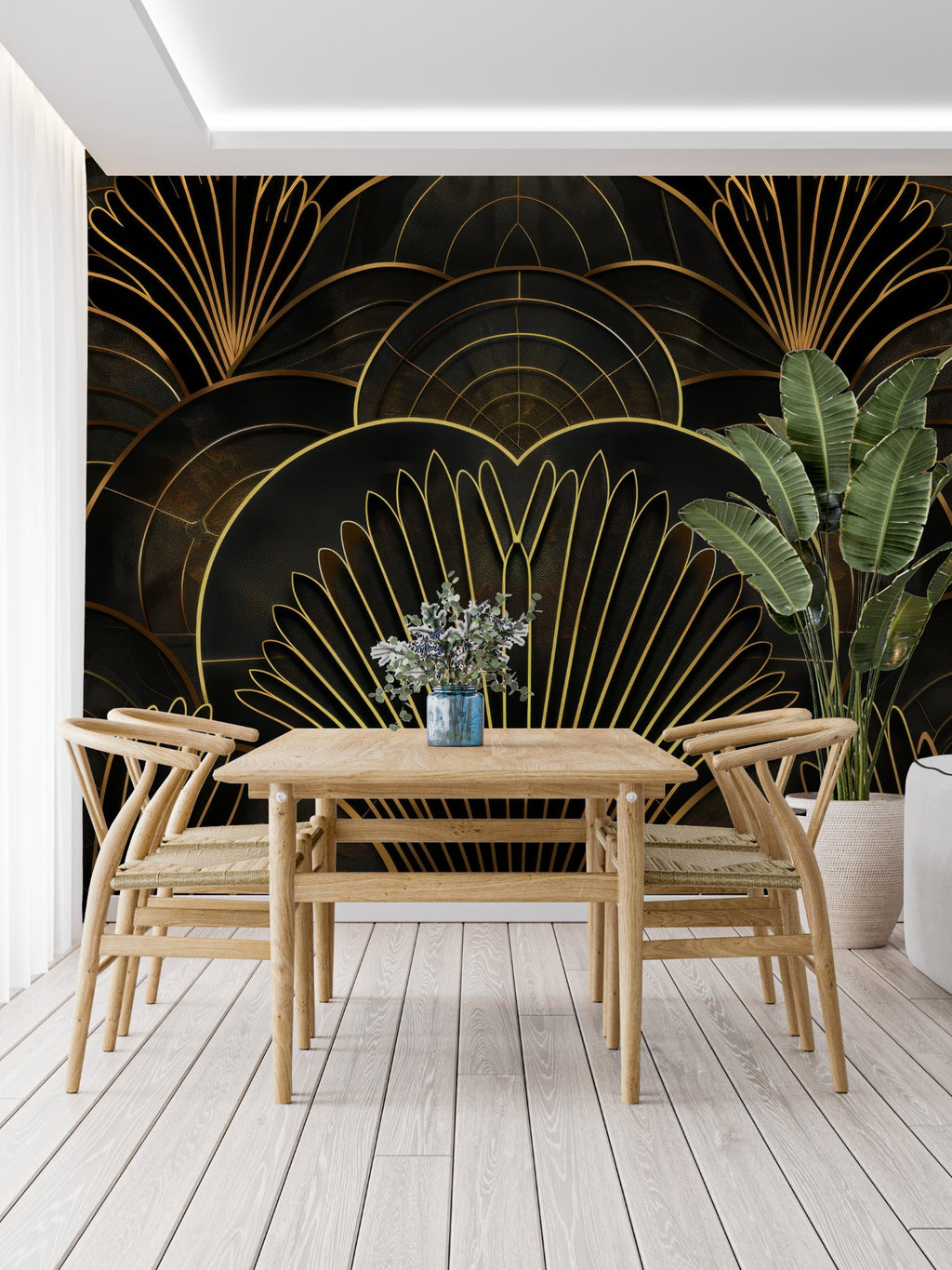 Art deco black and gold fan pattern wallpaper in modern living room with velvet sofa