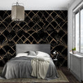 Art deco geometric wallpaper in modern living room, black and gold pattern creating dramatic accent wall