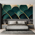 Art deco wallpaper with emerald and gold leaves creating drama in modern living room