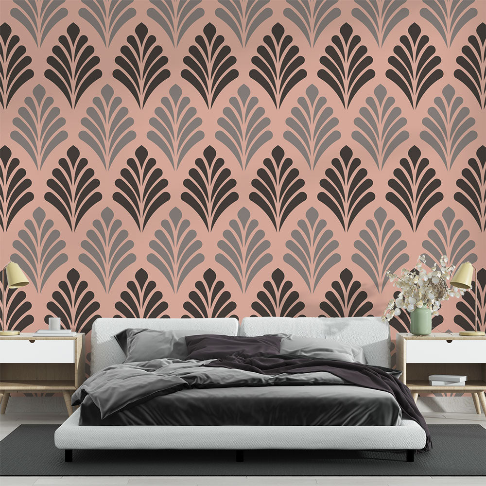 Art deco pink and black fan pattern wallpaper in a modern dining room with crystal chandelier and velvet chairs