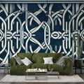 Art deco geometric wallpaper in navy bringing modern elegance to a luxury dining room with crystal chandelier