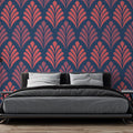 Art deco fan pattern wallpaper in pink and navy creating an elegant backdrop in a modern living room setting