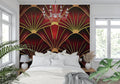 Art deco fan pattern wallpaper in red and gold creating drama in a modern living room with high ceilings