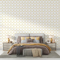 Art deco scale pattern wallpaper in white and gold creating a luxurious atmosphere in a modern living room
